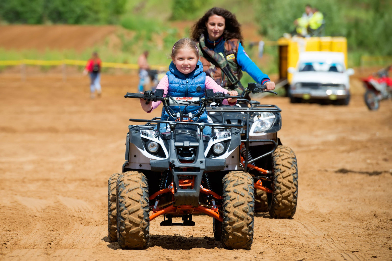 kid riding 125cc atv